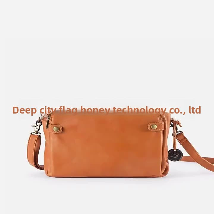 תיק עור עם רצועת עור